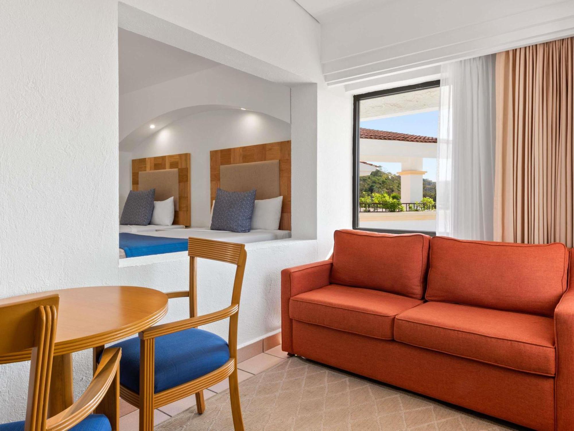 Deluxe Double Room Two Double Beds Sofa Bed Terrace Pool Access Ocean View
